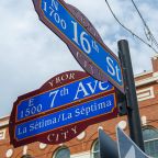 TAMPA, FL, USA - JAN. 26, 2019: Ybor road sign at E 7th Avenue at N 16th Street in Ybor City Historic District in Tampa, Florida FL, USA.