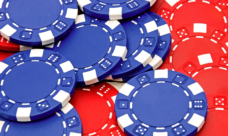 red and blue poker chips piled together