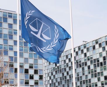 The Hague Netherlands - March 27 2016: The flag and the International Criminal Court at the new 2015 opened ICC building.